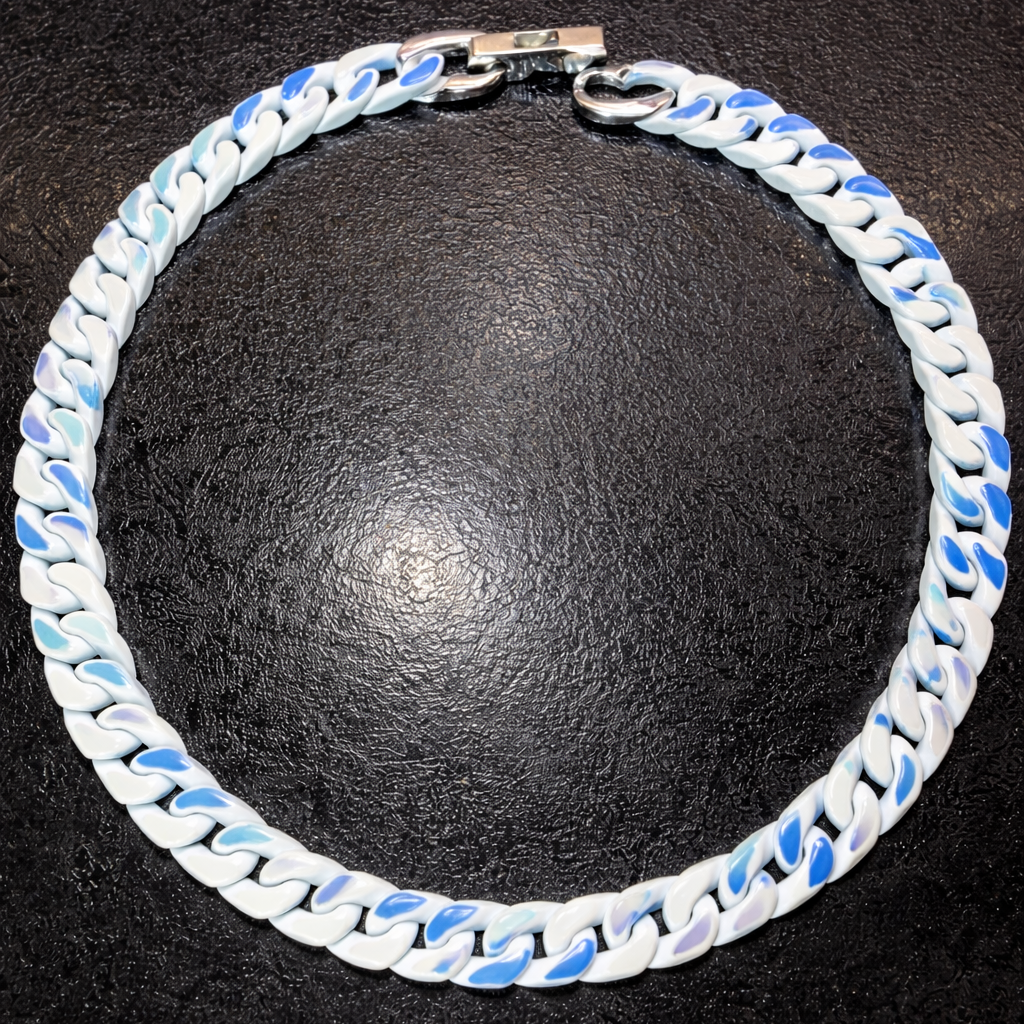 Glacier Chain ceramic link necklace on black background, white and blue ceramic links with stainless steel clasp