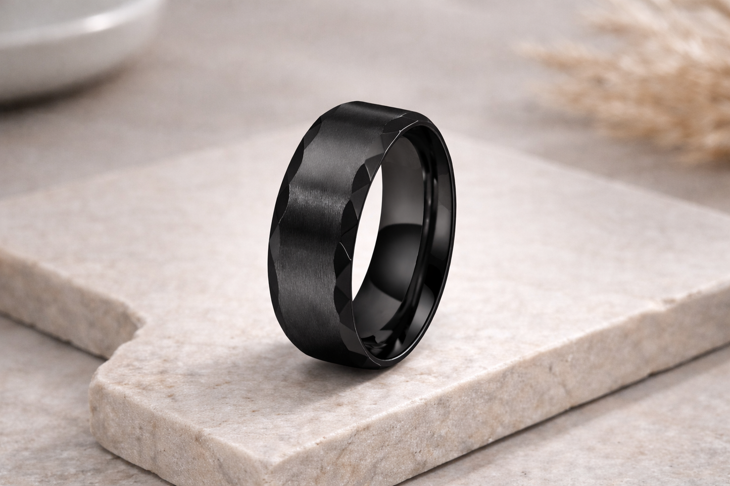 Black ring on a light stone surface