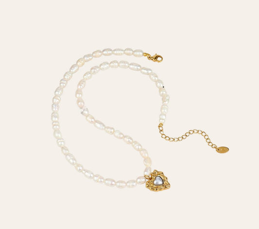 Beaded Heart Necklace with imitation pearls and gold-plated 316L heart charm, plain background