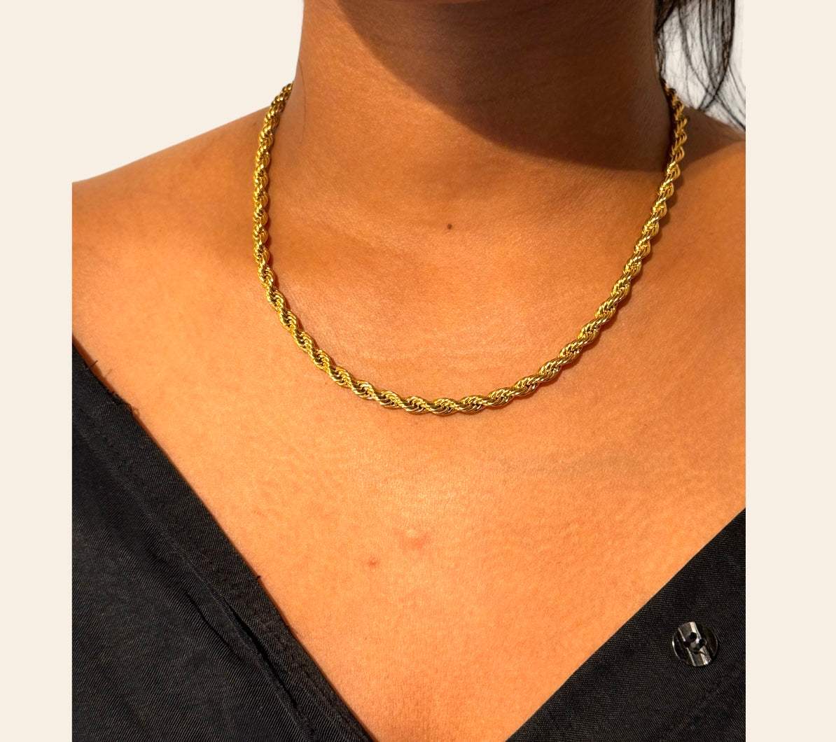 Bella Rope Chain Necklace in 18k gold-plated 316L worn at the collarbone, close view