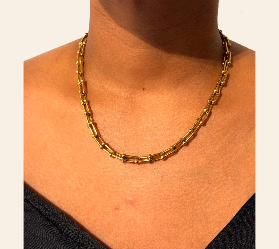 Capri U-Link Chain Necklace styled on model, modern beaded paperclip look