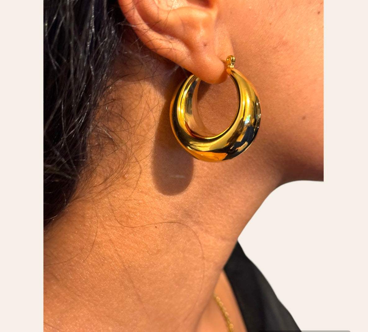 Cascade Dome Hoops on model — close-up fit, glossy teardrop dom