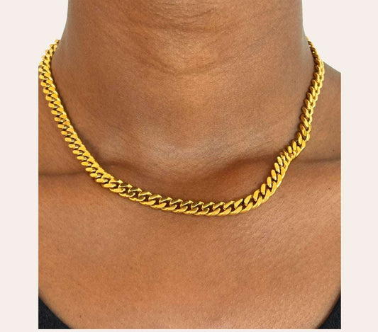 Cleo Curb Chain Necklace worn at the collarbone, fine curb links
