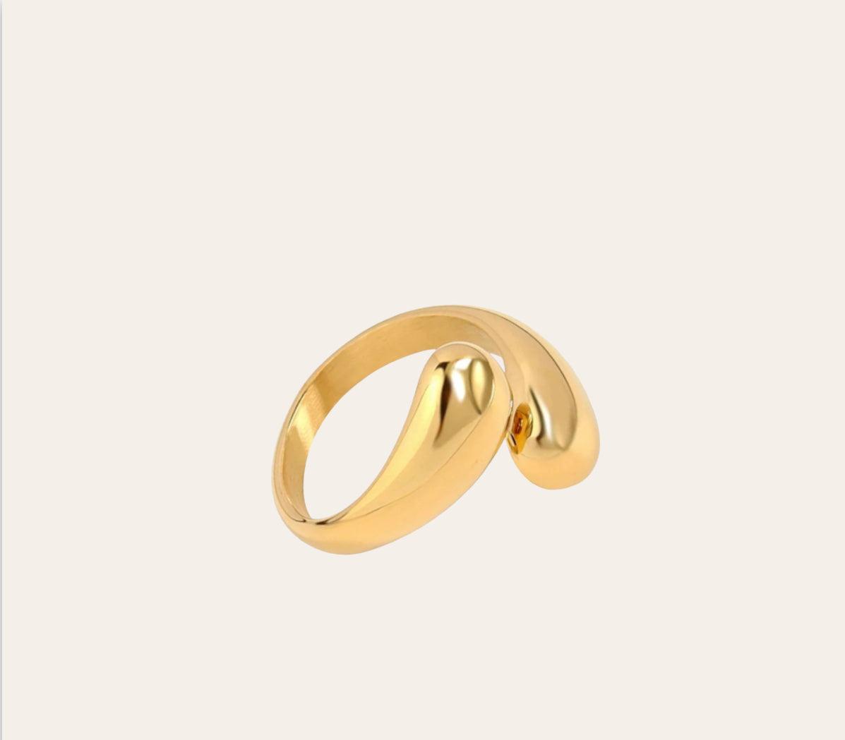 Daisy Ring sculptural wrap band in 18k gold-plated (PVD) 316L stainless steel on plain background