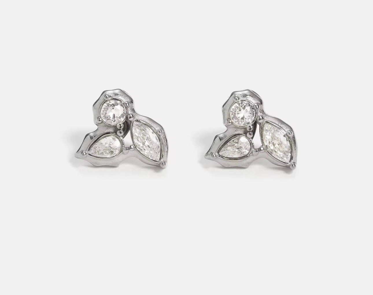 Silver Delilah stud earrings in stainless steel with clear zircon cluster design