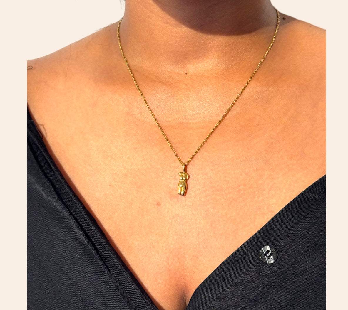 Goddess Torso Necklace styled on model, gold-plated finish