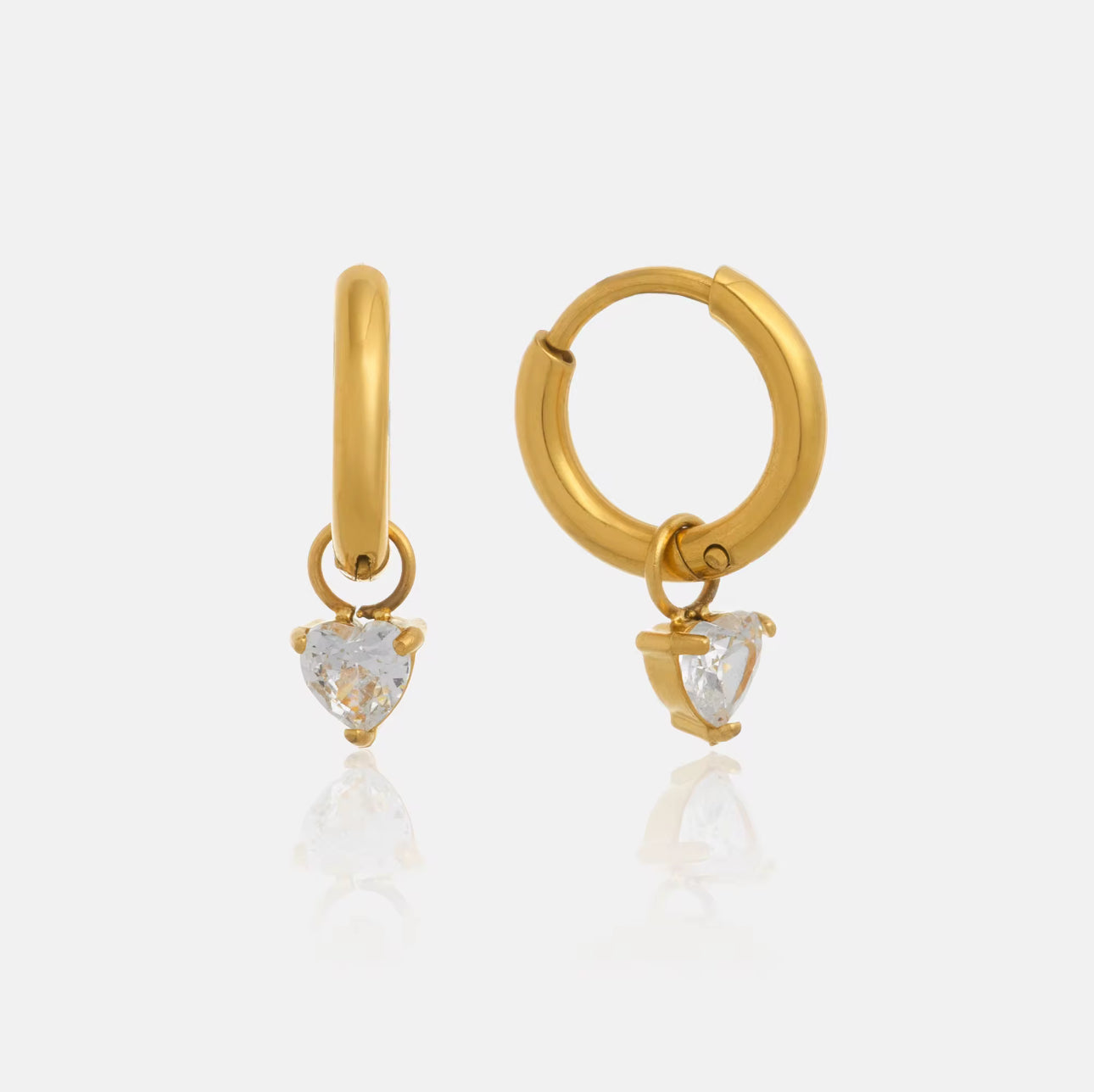 Gracy gold hoop earrings with dangling clear zircon charm