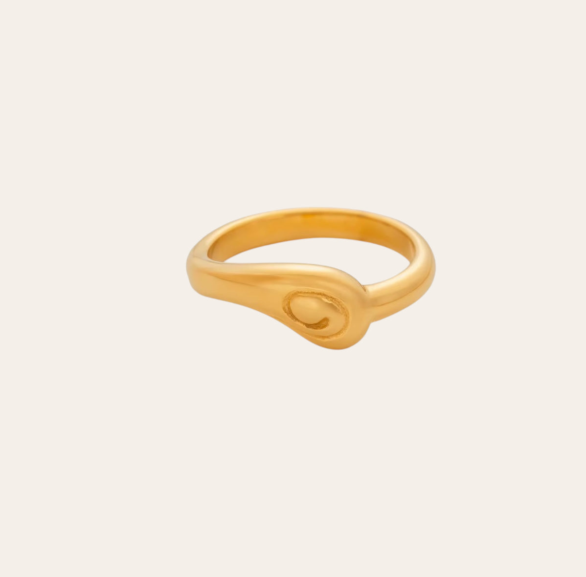 Infinity Ring, gold-plated 316L stainless steel band with infinity loop on plain background