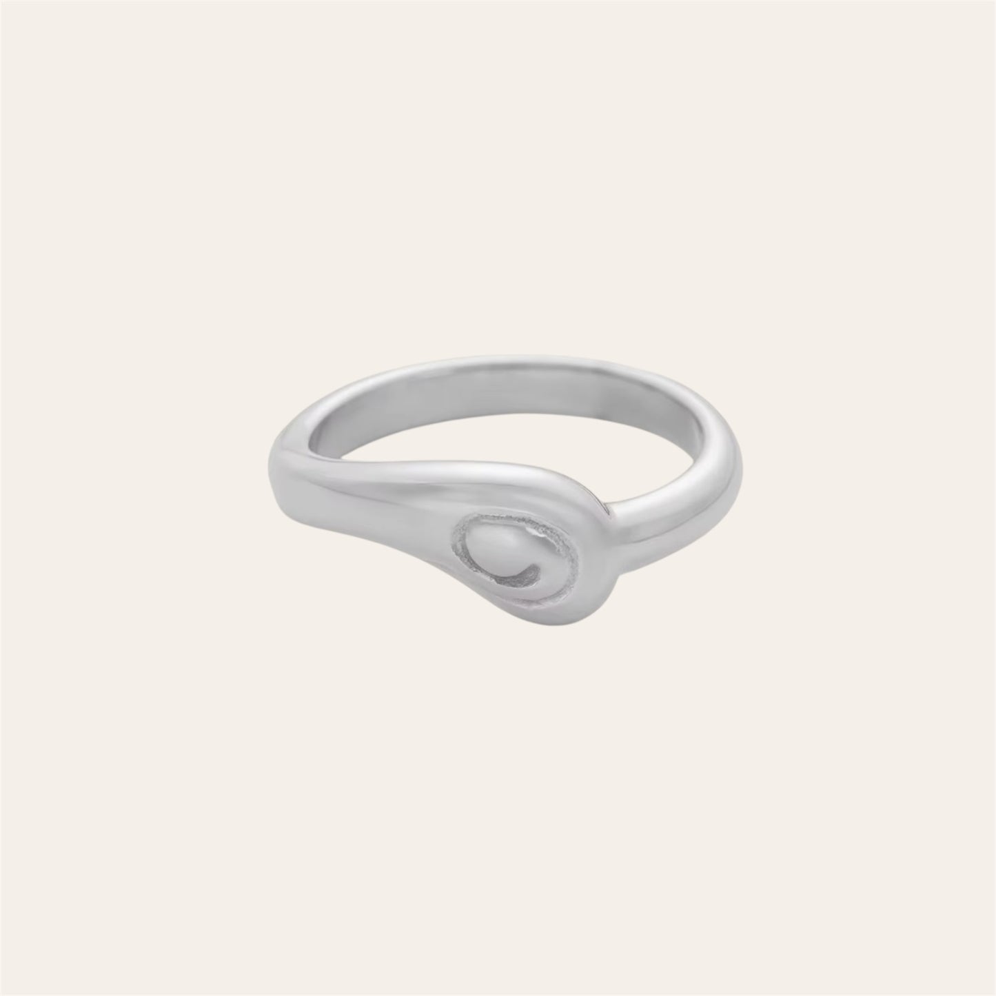 Infinity Ring in polished 316L stainless steel on plain background
