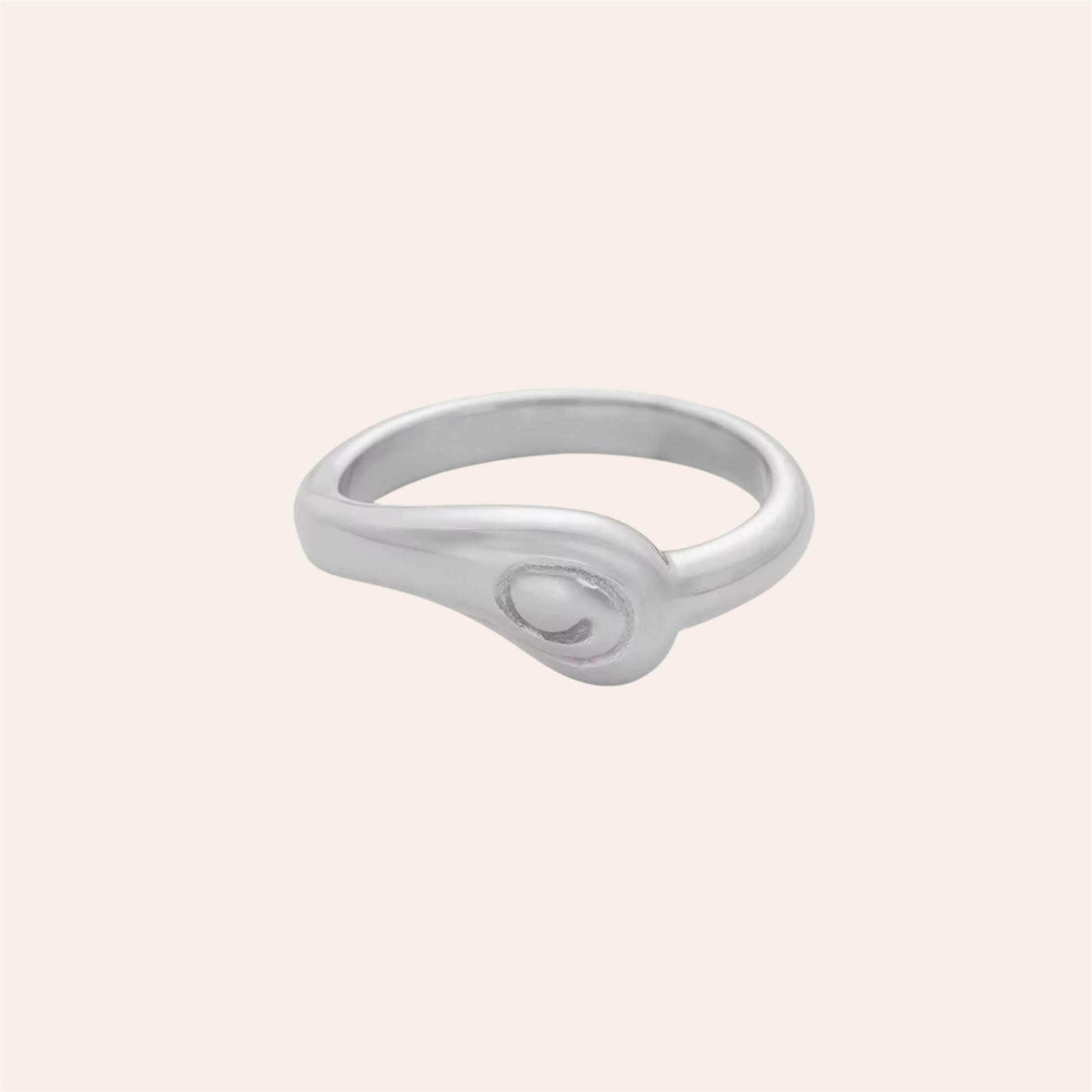Infinity Ring in polished 316L stainless steel on plain background