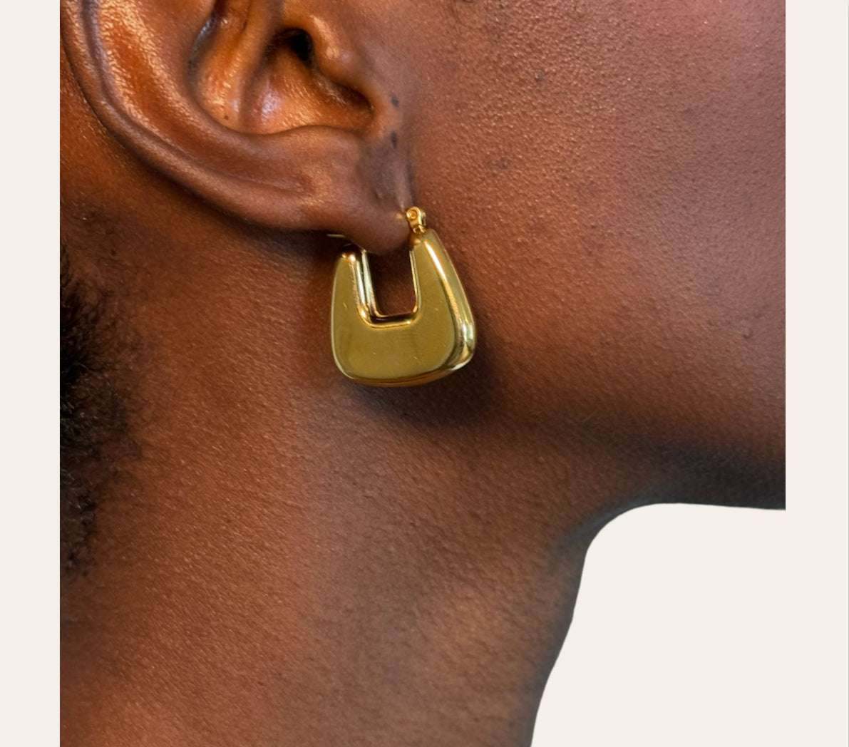 Laura Earrings on model  U-shaped open hoop, close-up, 25 mm