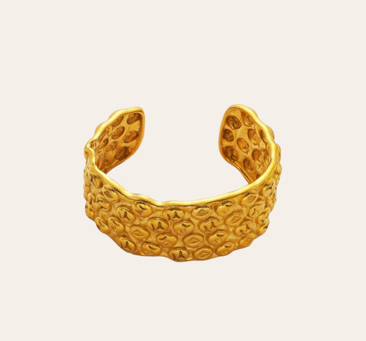 Lava Bangle with bold textured surface, crafted from Stainless Steel (316L) with 18k Gold-Plated PVD finish, waterproof hypoallergenic jewelry