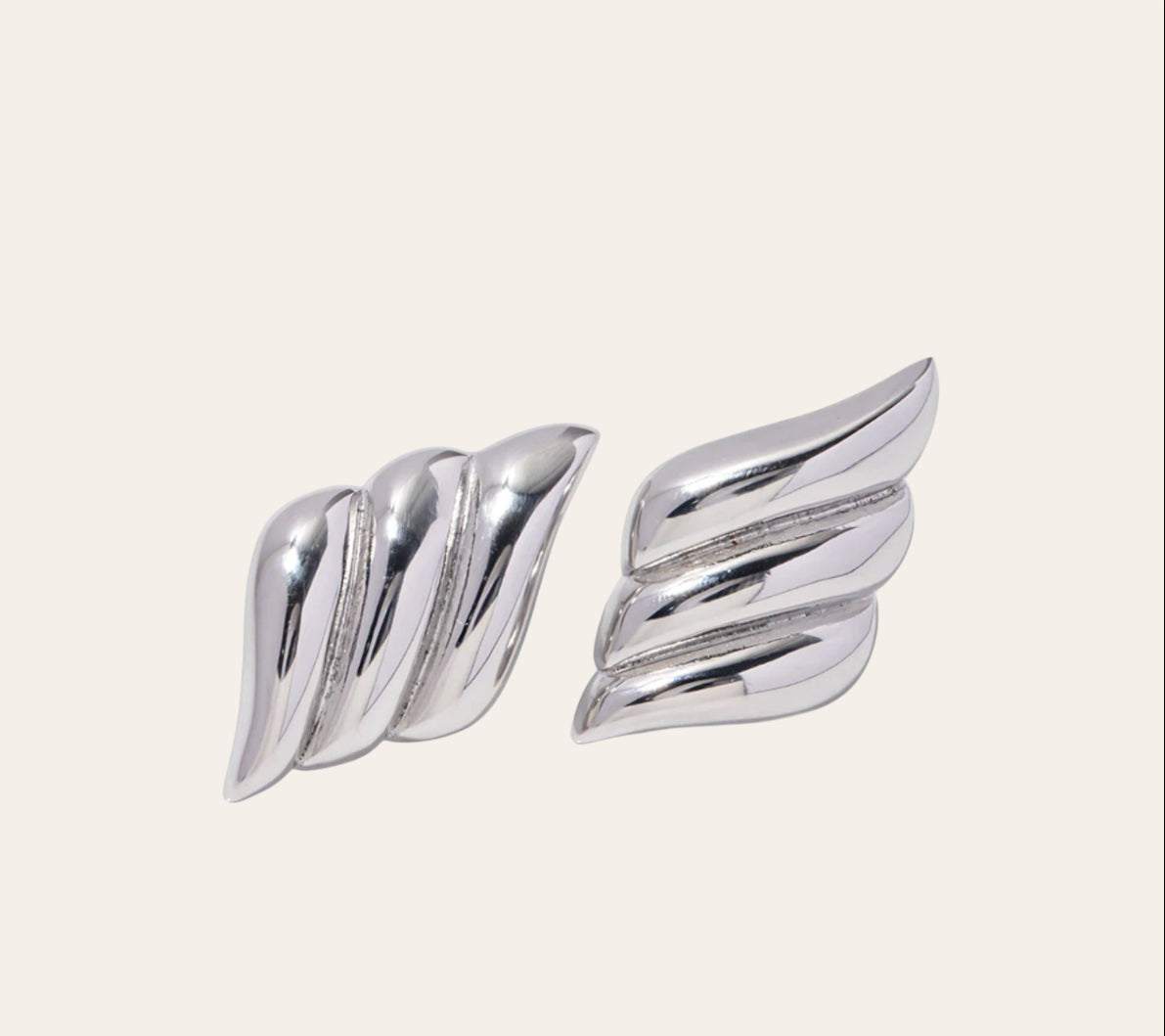 Lucy Earrings , winged sculptural studs (stainless steel), plain