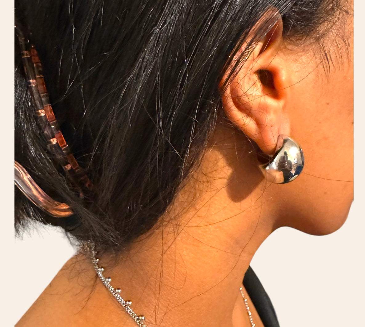 Luna Dome Studs on model  chunky crescent dome