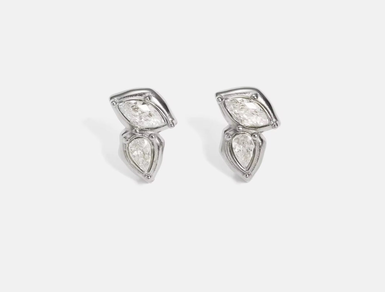 Close-up of clear zircon details on May stud earrings