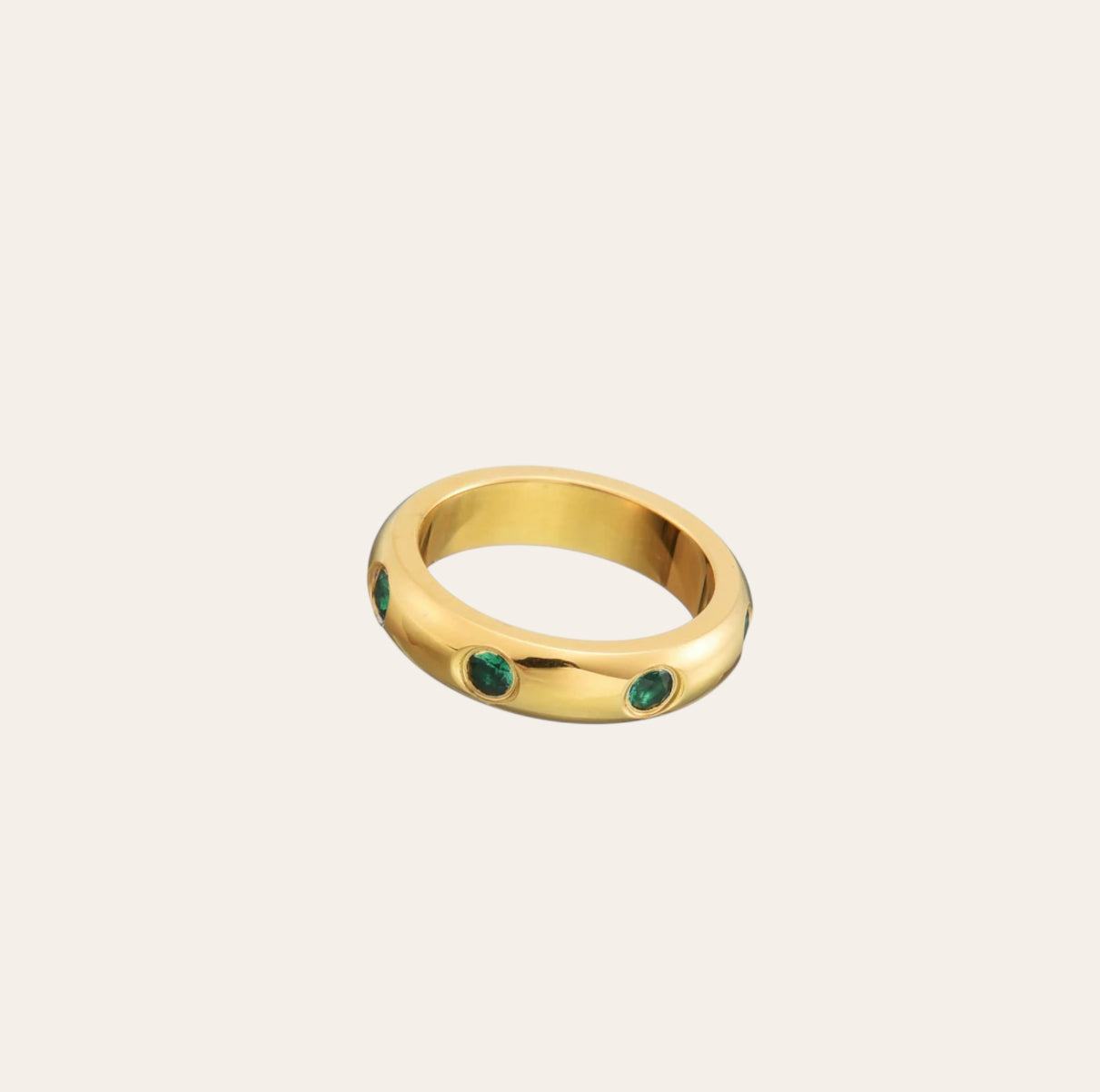 Olive Ring, gold-plated dome band with olive-green zircon accents on plain background