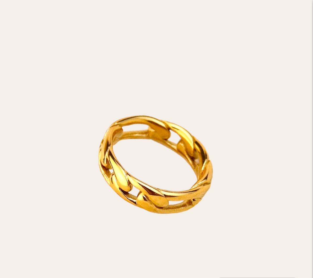 Talia Ring, gold-plated open-link band in 316L stainless steel on neutral background.